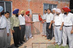 DEO Vijay Kaushal inaugurates the underground piping and submersible pump in Government Secondary School, Amloh, on Tuesday.