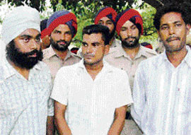 Three members of a gang who were held for making threat calls to a businessman.