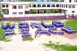 Students of St Soldier Divine Public School give a message of world peace to mark the 62nd anniversary of dropping of atomic bomb on Nagasaki in Noormahal