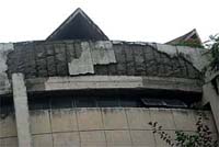 Cement coming off the walls of Guru Nanak District Library in Jalandhar. 
