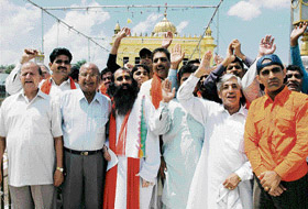 A Hindu jatha from Pakistan arrives at Durgiana Temple in Amritsar on Thursday after visiting various shrines in India.