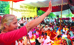Narmada Bachao Andolan leader Medha Patkar addresses activists of the Social Security Now on the implications of the UPA government's approval of social security for unorganised workers at Jantar Mantar in the Capital on Friday.