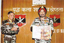 General J.J. Singh, Chief of Army Staff, releases the Army Training Command book "A Quest of Excellence" at Shimla on Friday.