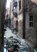 Waste dumped into storm water drains by roadside vendors has choked them. Garbage lying scattered in the streets is a common sight in the city.