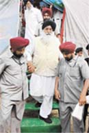 Punjab Chief Minister Parkash Singh Badal after addressing a function at Chak Kalan village, near Nakodar
