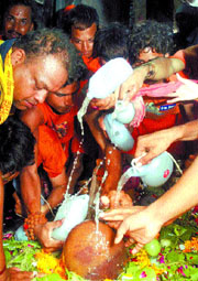 Kanwarias offer ganga jal to lord shiva in the Capital on Saturday.