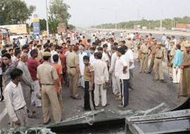 Scene in front of the police station on NH-8, Gurgaon, that was attacked by kanwarias on Saturday.