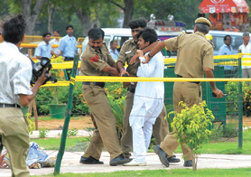 A Janbhavna Party activist being arrested for a bid to fix a statue of Netaji Subhash Chandra Bose at India Gate in the Capital on Sunday.