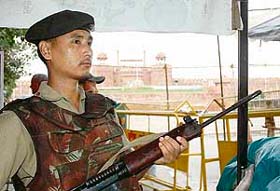 A security personnel keeps vigil outside the Red Fort in New Delhi