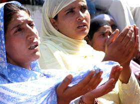 Kashmiri women pray at the Hazratbal shrine in Srinagar on Sunday as Shab-e-Mehraj was observed in the Kashmir valley with religious fervor and gaiety.