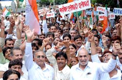 Congress workers led by Sajjan Kumar protest against the saffronisation of MCD Headquaters at Town Hall in the Capital on Monday. 