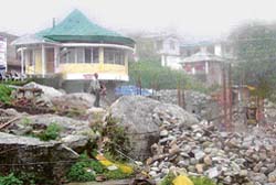 A view of the disputed shopping complex under construction at McLeodganj.