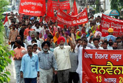 Members of the Punjab Nirman Mazdoor Union take out rally in Jalandhar on Monday. 