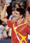 Novak Djokovic of Serbia celebrates his win over Roger Federer of Switzerland during the final of the Montreal Masters.