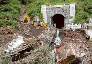 A view of the damaged railway track at Koti following a cloudburst in the area.