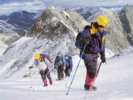 Charu Sharma (foreground) and Mandip Singh Soin climbing in the Swiss Alps with friends this summer.