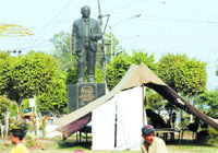 Security personnel guard the statue of Dr BR Ambedkar in Jalandhar.  Tribune photo by Pawan Sharma