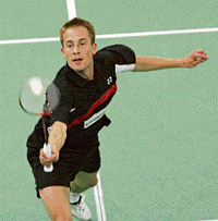 Denmark's Peter Gade keeps his eyes on the shuttle as he returns a shot from England's Andrew Smith during the Malaysian World Badminton Championships in Kuala Lumpur on Tuesday Gade won 21-18, 21-10.  AFP photo
