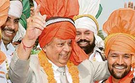 Chief Justice of Punjab and Haryana High Court Vijender Jain (centre) along with folk dancers at a function to mark Independence Day in Chandigarh