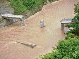 The Talwar-Bhapral bridge in Bilaspur district, which has collapsed due to flash floods in the Seer khad caused by rain.
