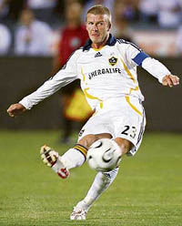 Los Angeles Galaxy captain David Beckham takes a free kick during the SuperLiga semifinal against DC United in California on Wednesday.