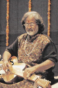 Grammy Award winner Pt. Vishwa Mohan Bhatt performs at Thapar University in Patiala on Friday.