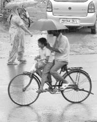 Heavy rain in Patiala forced people to take out their umbrellas