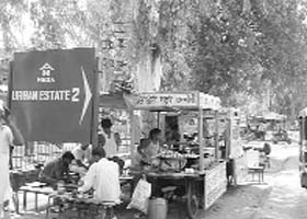 Unauthorised roadside eateries at the Urban Estate II crossing on the Delhi road in Hisar