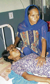 A woman with her daughter at the Nurpur primary health centre