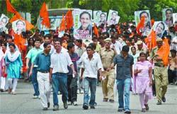 ABVP supporters take part in a rally for the upcoming DUSU election at North Campus in the Capital on Friday
