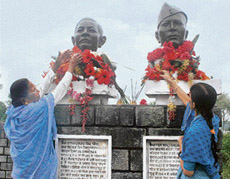 Tributes being paid to Shaheed Durga Mal (left) at Dari, near Dharamsala