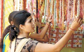 Is this 'rakhi' right for my brother? A girl asks her mate in a Delhi bazaar