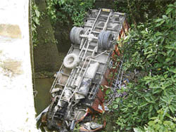 The ill-fated truck that plunged into a gorge on the Hamirpur-Nadaun road near Nohgi on Monday morning.