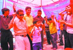 Team members of an FM channel cheer inmates of Rashtriya Andh Vidyalaya in Jalandhar