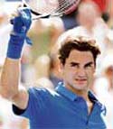 Top seed Roger Federer acknowledges the crowd after defeating Scoville Jenkins of the US in the first round of the US Open. Federer won 6-3, 6-2, 6-4. 