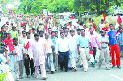 Dalits protest outside district administrative complex in Jalandhar on Wednesday.