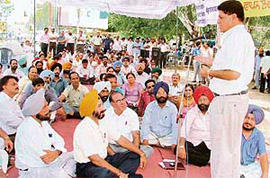 Rajinder Bhandari, president of the BJPs state unit, addresses teachers in Ludhiana on Wednesday.