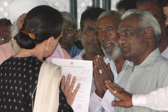 Congress President Sonia Gandhi meets members of a Dalit community from Gohana at her residence in New Delhi on Friday. They were in the capital to express their grievances on the recent killing of a Dalit youth