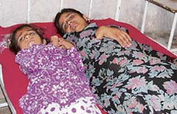 Reena Devi and her daughter in the civil hospital, Nurpur