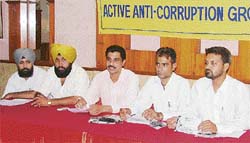 Members of the Active Anti-Corruption Group address a press conference in Ludhiana on Friday.
