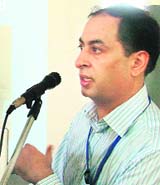 Dr Nitin Batra, ophthalmologist at the CMCH, delivers a lecture on eye donation at the Khalsa College for Women in Ludhiana on Friday.