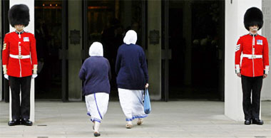 Two nuns arrive at the service of thanksgiving for the life of Diana at the Guards' Chapel, in London on Friday.