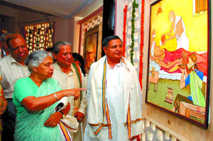 Delhi Chief Minister Sheila Dikshit along with health minister Yoganand Shastri visits an exhibition after inaugurating the Golden Jubilee Year Celebrations of MAMC in the Capital on Saturday.