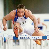 Czech Republics Roman Sebrle competes in the 110 metres hurdles during the decathlon event at the 11th IAAF World Athletics Championships in Osaka on Saturday.