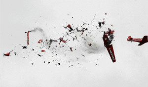 Two airplanes from the Polish flying acrobatic team Zelazny collide midair at an air show in Radom, 100 km from Warsaw, Poland, on Saturday.