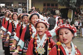 Tibetan girls perform in a cultural programme held to commemorate the 47th anniversary of the establishment of the Tibetan government-in-exile at McLeodganj, Dharamsala