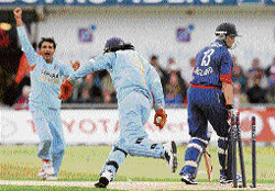 Sourav Ganguly celebrates with Mahendra Singh Dhoni after dismissing Englands Matt Prior at Leeds