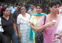 Family members of the victims of Uphaar tragedy at Patiala House Court in the Capital on Wednesday. 