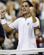 David Ferrer of Spain celebrates after defeating compatriot Rafael Nadal at the US Open tennis tournament in Flushing Meadows on Tuesday. Ferrer won 6-7, 6-4, 7-6, 6-2.