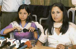 Daughter (left) and sister of Maj-Gen A.K. Lal, accused of sexual exploitation of a woman officer, Capt Neha Rawat, at a press conference in Chandigarh on Thursday.